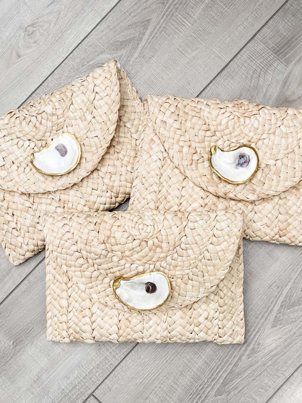 Handwoven Natural Straw Clutch with Shell Accent